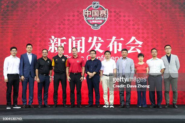 Steve Mayer, Danton Heinen, Martin Gelinas, William Wang, Jin Fei, Wang Meng and other guest pose for group photo during a press conference before...