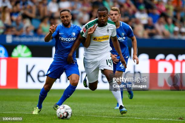 Sidney Sam of VfL Bochum and Alassane Plea of Borussia Moenchengladbach battle for the ball during the H-Hotels Cup match between VfL Bochum and...
