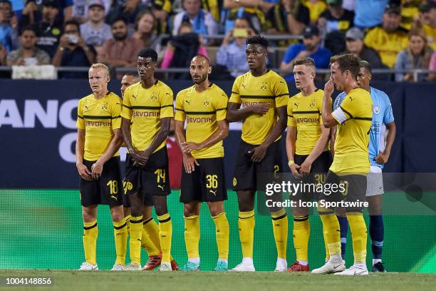 Borussia Dortmund midfielder Sebastian Rode , Borussia Dortmund forward Alexander Isak , Borussia Dortmund defender Omer Toprak , Borussia Dortmund...