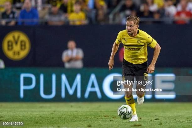 Borussia Dortmund defender Marcel Schmelzer dribbles the ball during an International Champions Cup match between Manchester City and Borussia...