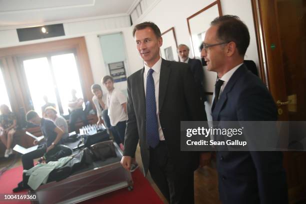 British Foreign Secretary Jeremy Hunt and German Foreign Minister Heiko Maas arrive to address the media at the Foreign Ministry on July 23, 2018 in...
