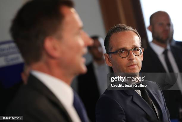 British Foreign Secretary Jeremy Hunt and German Foreign Minister Heiko Maas speak to the media at the Foreign Ministry on July 23, 2018 in Berlin,...