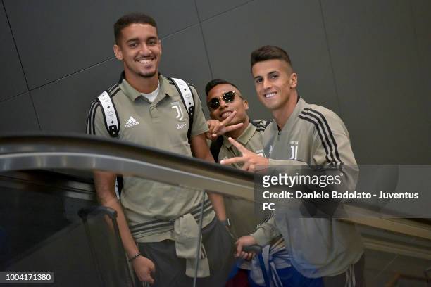 Juventus player Matheus Pereira , Alex Sandro and Joao Cancelo depart for the summer tour 2018 on July 23, 2018 in Turin, Italy.