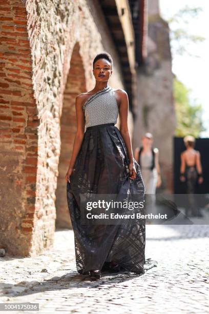 Model walks the runway during the Mondovi show, at Strada Cetatii, during Feeric Fashion Week 2018, on July 21, 2018 in Sibiu, Romania.