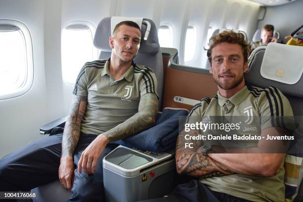 Juventus player Federico Bernardeschi and Claudio Marchisio departs for the summer tour 2018 on July 23, 2018 in Turin, New York.