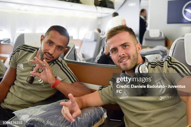 Juventus player Medhi Benatia and Miralem Pjanic departs for the summer tour 2018 on July 23, 2018 in Turin, New York.