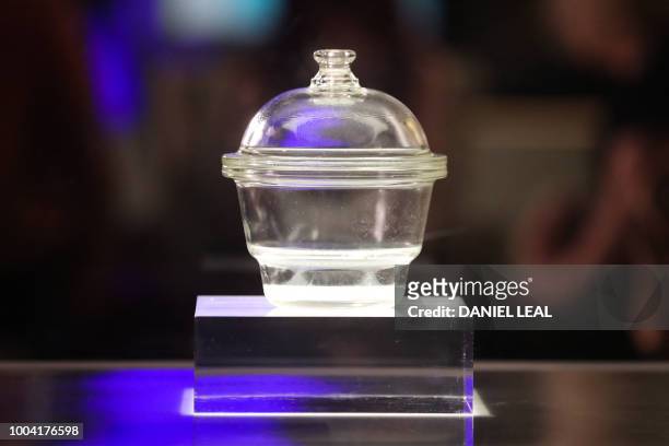 Glass desiccator, a jar used in early IVF treatments to keep the petri dish free from moisture, is seen on display as part of an exhibition 'IVF: 6...