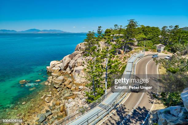 elevated roadway at geoffrey bay,magnetic island,queensland,australia - coastal road stock pictures, royalty-free photos & images