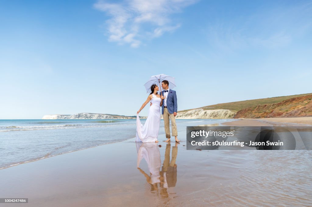 Beach wedding couple.