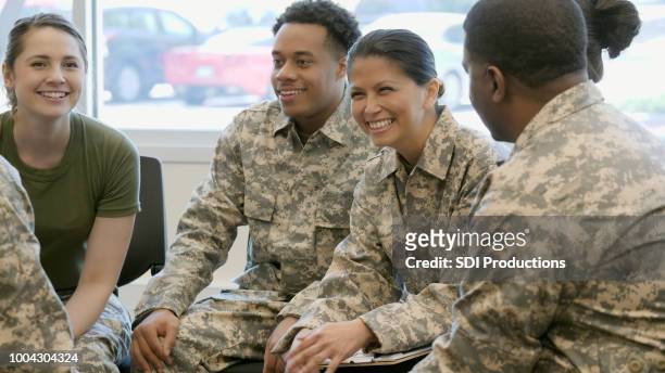 group of new military recruits in classroom training - armed forces stock pictures, royalty-free photos & images