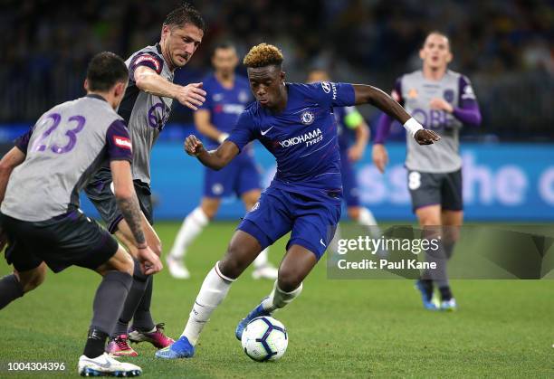 Callum Hudson-Odoi of Chelsea controls the ball against Dino Djulbic and Scott Neville of the Glory during the international friendly between Chelsea...