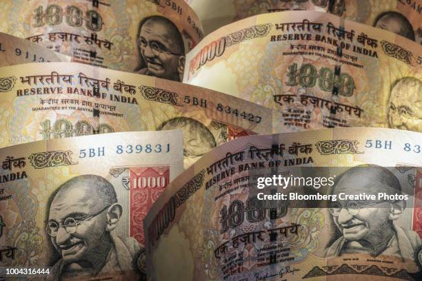 indian one thousand rupee banknotes - rupee stock pictures, royalty-free photos & images