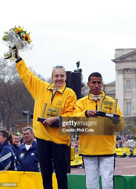 Paula Radcliffe of England and Khalid Khannouchi of USA celebrates after winning the Flora London Marathon Elite Mens and Womens races London....