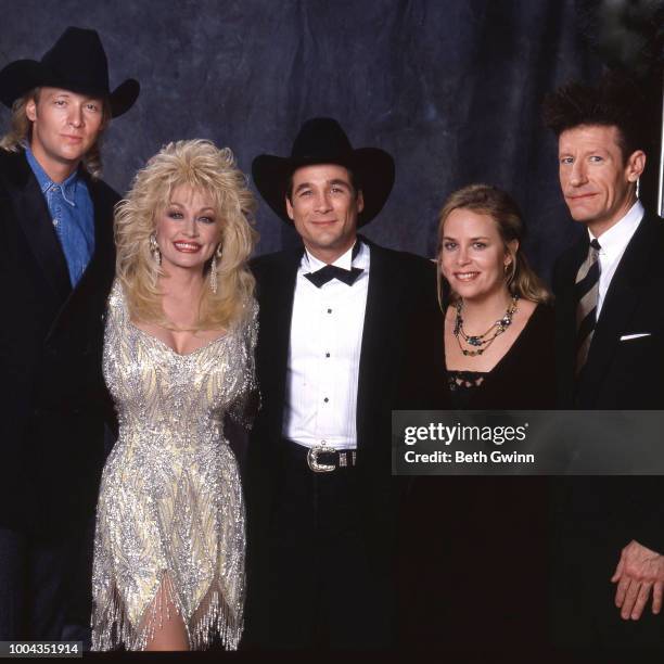 Country singer and songwriter Alan Jackson, Dolly Parton, Clint Black, Mary Chapin Carpenter, and Lyle Lovett backstage before the CMA Award Show...