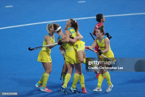 Ambrosia Malone of Australia celebrates scoring their second goal during the Pool D game between Australia and Japan of the FIH Womens Hockey World...