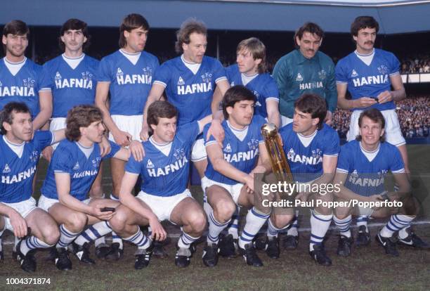 The Everton team line up for a group photo after their 2-0 victory over West Ham United had clinched the Canon League Division One Championship at...