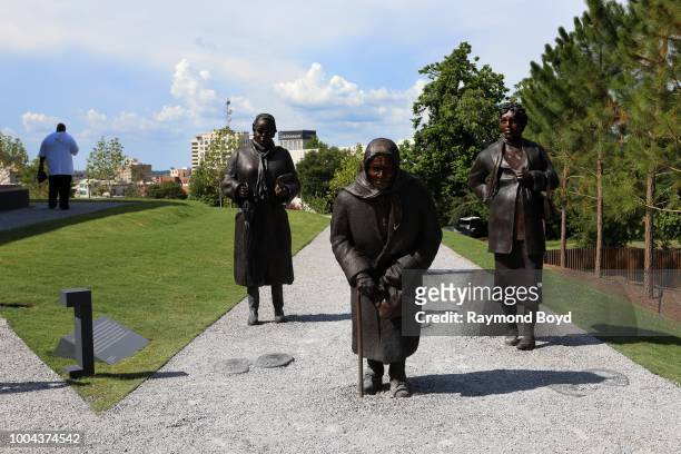 Dana King's 'Guided By Justice' statue, dedicated to black women who sustained the Montgomery Bus Boycott and collectively walked thousands of miles,...