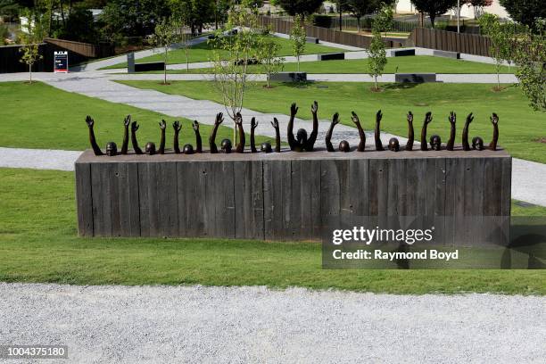 Hank Willis Thomas' 'Raise Up' statue, which depicts contemporary issues of police violence and racially biased criminal justice, stands inside The...