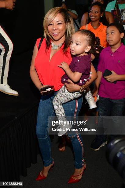 Tameka Harris and Heiress Harris attend 'The Grand Hustle' Exclusive Viewing Party at at The Gathering Spot on July 19, 2018 in Atlanta, Georgia.