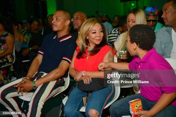 Rapper/actor Tip 'T.I.' Harris, Tameka Harris and Major Harris attend 'The Grand Hustle' Exclusive Viewing Party at at The Gathering Spot on July 19,...