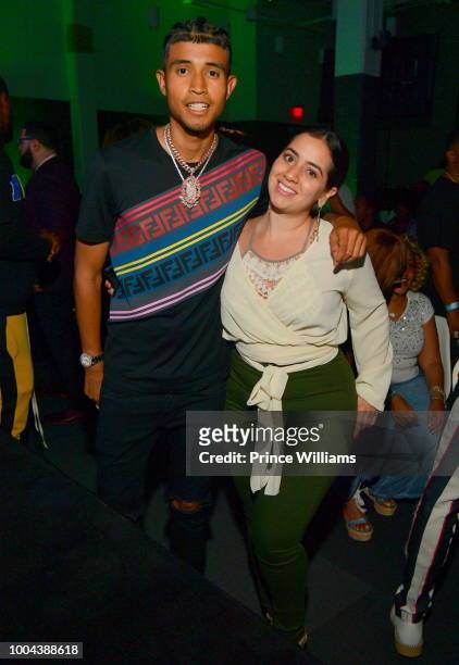Kap G and Dina Marto attend attend 'The Grand Hustle' Exclusive Viewing Party at at The Gathering Spot on July 19, 2018 in Atlanta, Georgia.