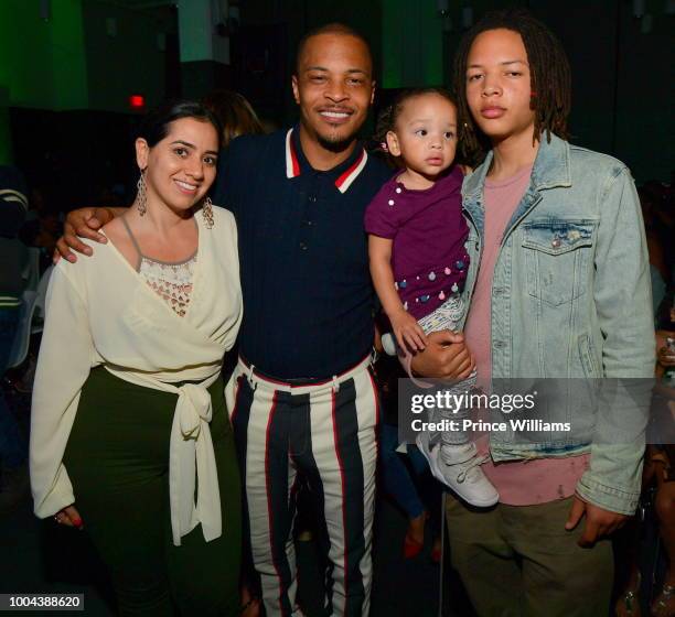 Dina Marto, Tip 'T.I.' Harris, Heiress Harris and Domani Harris attend 'The Grand Hustle' Exclusive Viewing Party at at The Gathering Spot on July...