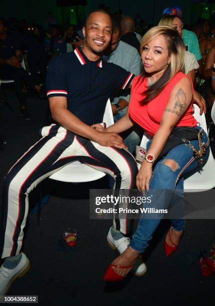 Rapper/actor Tip 'T.I.' Harris and Tameka 'Tiny' Harris attend 'The Grand Hustle' Exclusive Viewing Party at at The Gathering Spot on July 19, 2018...