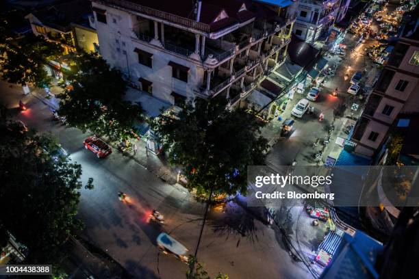 Traffic travels through the streets at night in Phnom Penh, Cambodia, on Sunday, July 22, 2018. Asias longest-serving Prime Minister Hun Sen seeks...