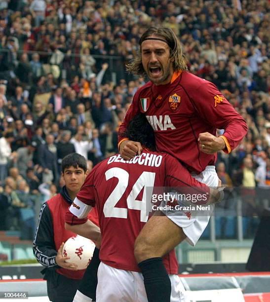 Marco Delvecchio and Gabriel Batistuta of Roma celebrate a goal during the Serie A match between Roma and Parma, played at the Olympic Stadium, Roma....