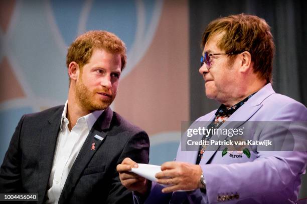 Sir Elton John and Prince Harry, Duke of Sussex attend the 2018 International AIDS Conference on July 24, 2018 in Amsterdam, Netherlands.