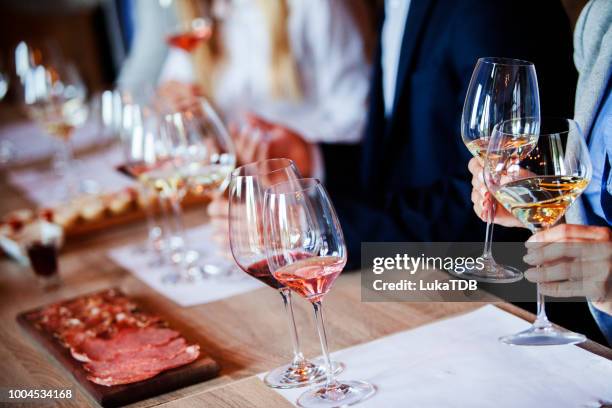 wine glasses on the table - judges table stock pictures, royalty-free photos & images