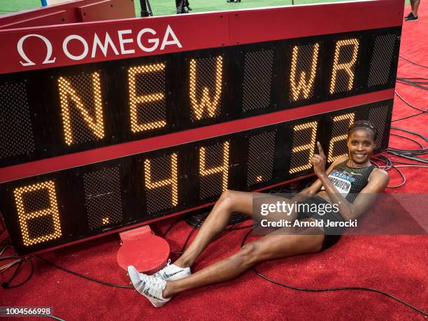 Kenya's Beatrice Chepkoech celebrates after her new world record in the women's 3000 metre steeplechase of the IAAF Diamond League athletics...