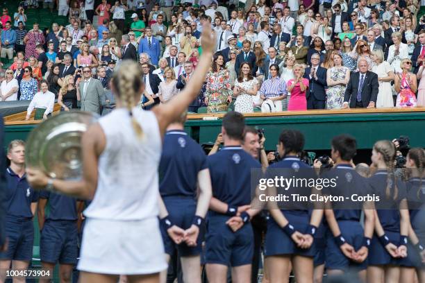 Meghan, Duchess of Sussex and Catherine, Duchess of Cambridge applaud the winner Angelique Kerber of Germany after the Ladies' Singles Final on...