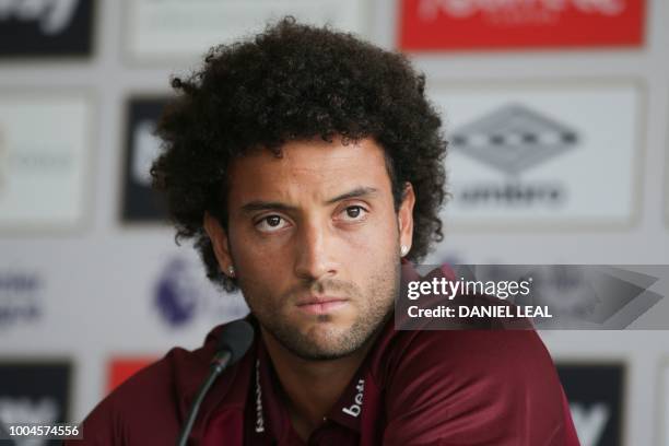 West Ham United's new Brazlian midfielder Felipe Anderson attends a press conference at the unveiling of the club's new manager and newly signed...