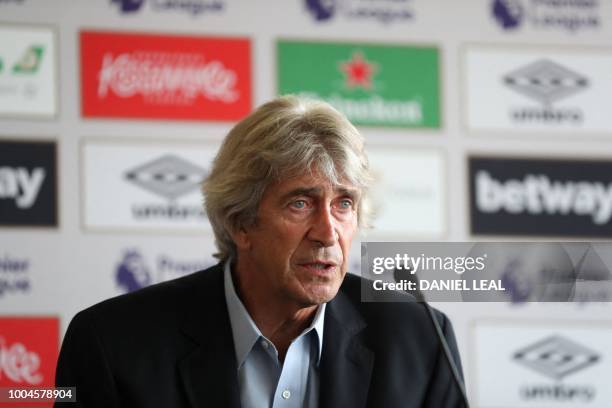 West Ham United's Chilean manager Manuel Pellegrini attends a press conference at the unveiling of the club's new manager and newly signed players,...