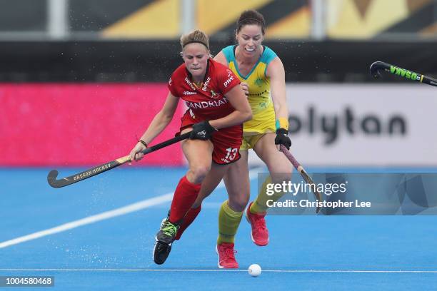 Alix Gerniers of Belgium battles with Kerri McMahon of Australia during the Pool D game between Australia and Belgium of the FIH Womens Hockey World...