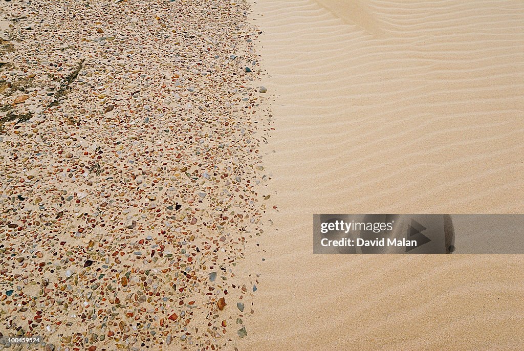 Boundary between pebbles & smooth sand