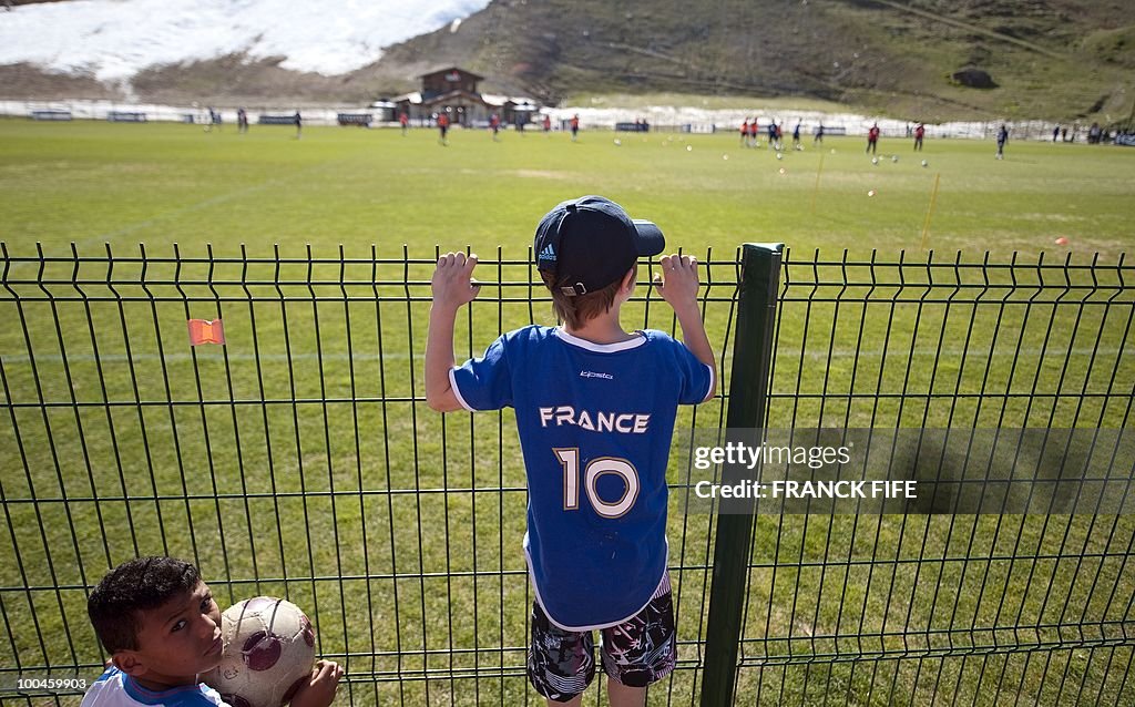 A boy (C) wearing the French national fo
