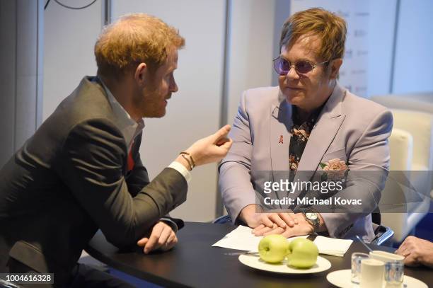 Prince Harry, Duke of Sussex and Sir Elton John attend the Launch of the Menstar Coalition To Promote HIV Testing & Treatment of Men on July 24, 2018...