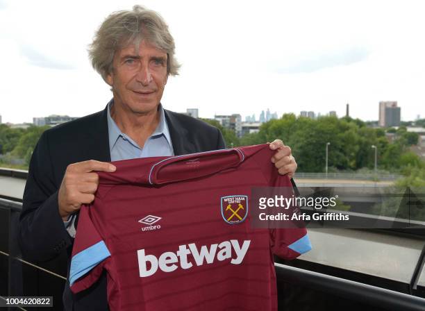 Manuel Pellegrini of West Ham United at the Press Conference to officially unveil the club's new manager and newly signed players Felipe Anderson and...