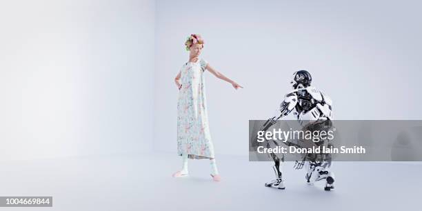 older woman telling off robot - granny smith stock pictures, royalty-free photos & images