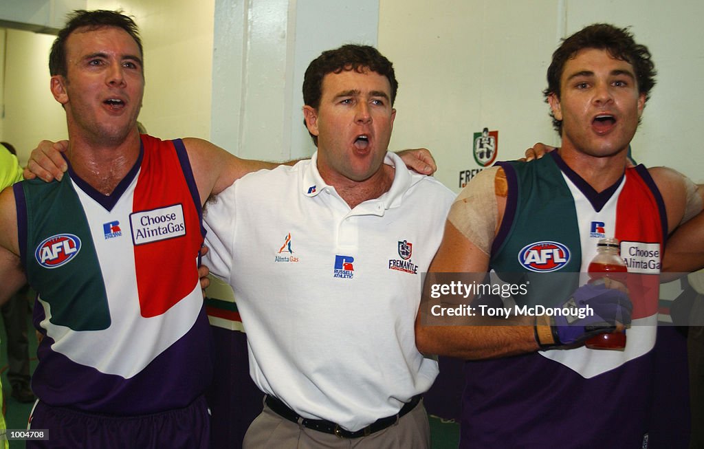 07 Apr 2002:  Jason Norrish #25, Chris Connolly and Troy Longmuir #21 for the Fremantle Dockers cele