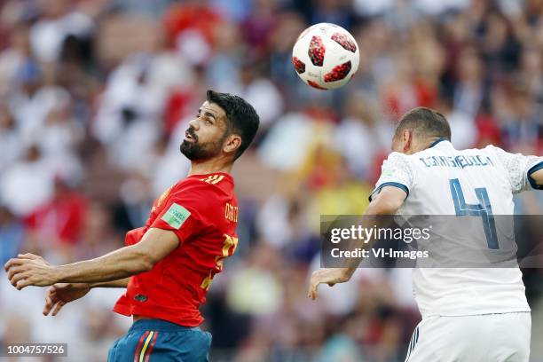 Diego Costa of Spain, Sergei Ignashevich of Russia during the 2018 FIFA World Cup Russia round of 16 match between Spain and Russia at the Luzhniki...