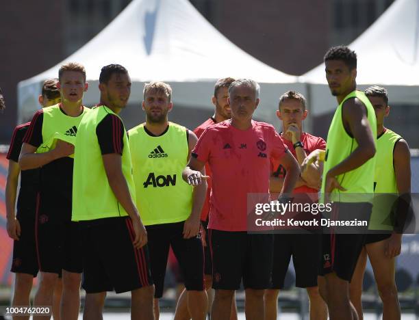 Manager Jose Mourinho of Manchester United surrounded by players during a pre-season training at UCLA on July 24, 2018 in Los Angeles, California.