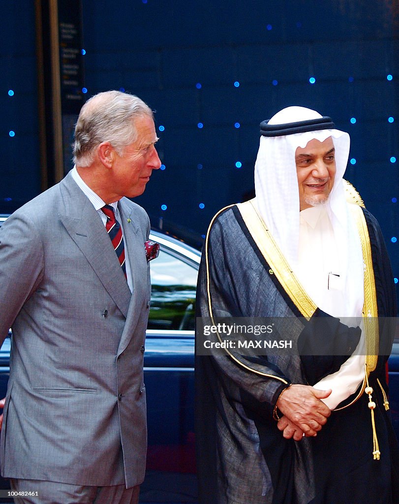 Britain's Prince Charles (L) flanked by