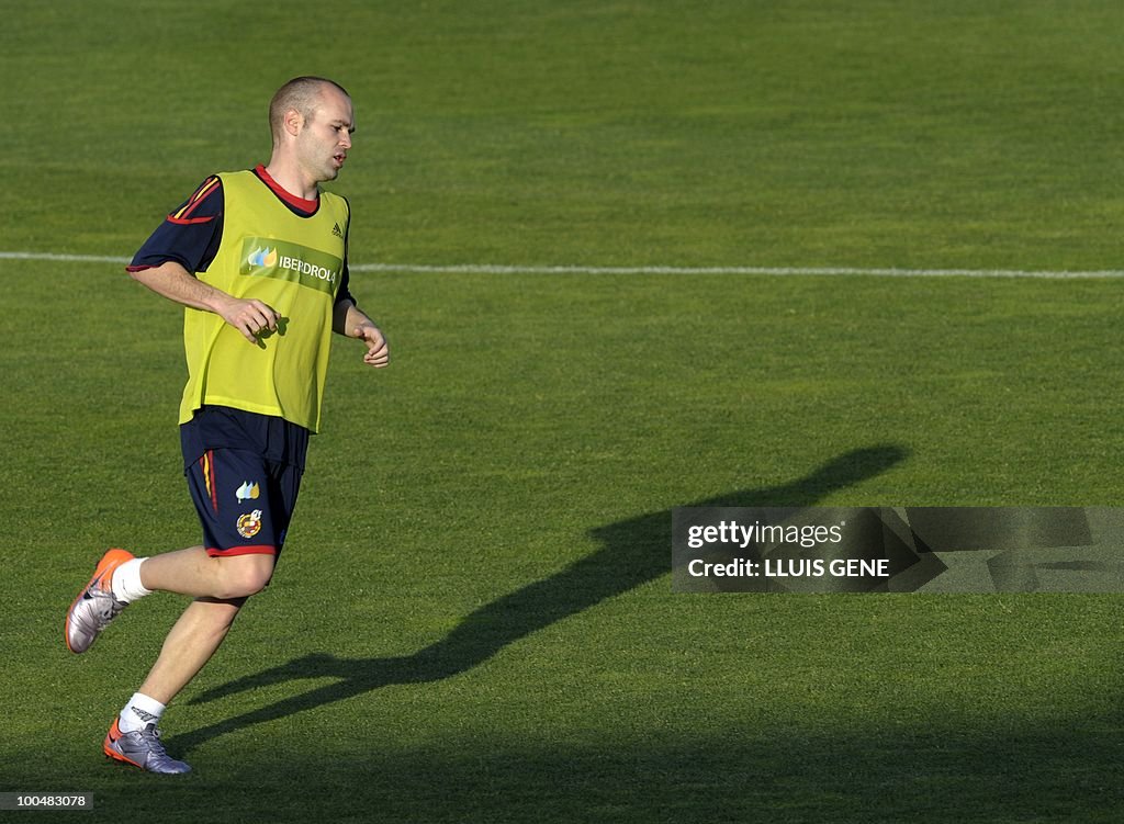 Spain's midfielder Andres Iniesta takes