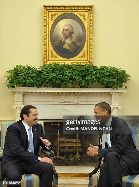 Lebanon�s Prime Minister Saad Hariri speaks with US President Barack Obama on May 24, 2010 during a meeting in the Oval Office of the White House in...