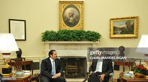 President Barack Obama speaks with Lebanon�s Prime Minister Saad Hariri during a meeting on May 24, 2010 in the Oval Office of the White House in...