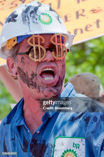 Code Pink activist dressed as an oil roughneck takes part in a demonstration outside the U.S. Headquarters of BP Plc in Houston, Texas, U.S., on...