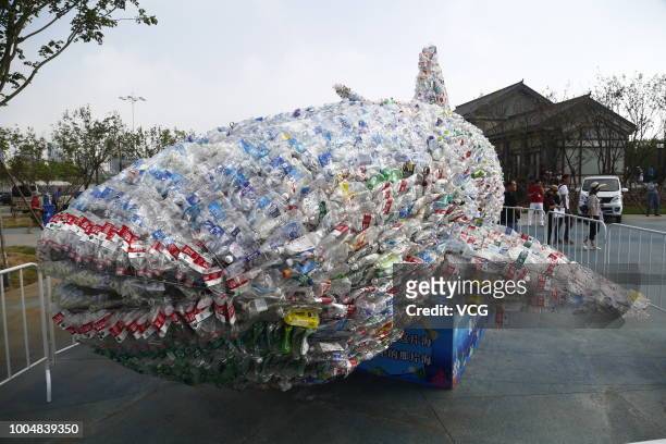 Metre-long whale made of 40,000 abandoned plastic bottles is on display at Rizhao Ocean Park on July 21, 2018 in Rizhao, Shandong Province of China....